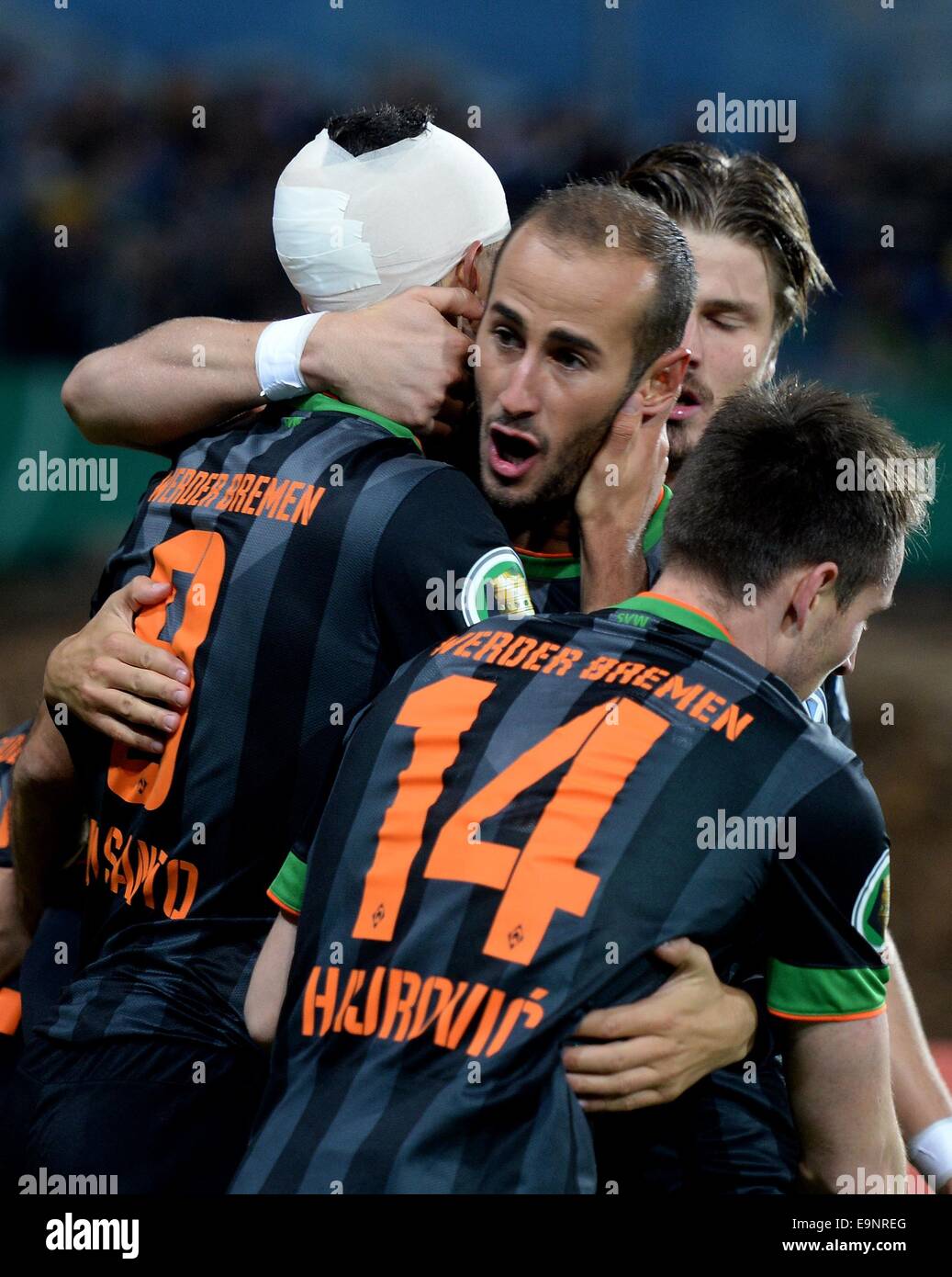 Chemnitz, Germany. 28th Oct, 2014. Bremen's Franco Di Santo (L) celebrates the 2-0 goal with his teammates during the DFB Cup second round match between Chemnitzer FC and Werder Bremen at the Stadium on Gellerstrasse in Chemnitz, Germany, 28 October 2014. Photo: HENDRIK SCHMIDT/dpa/Alamy Live News Stock Photo