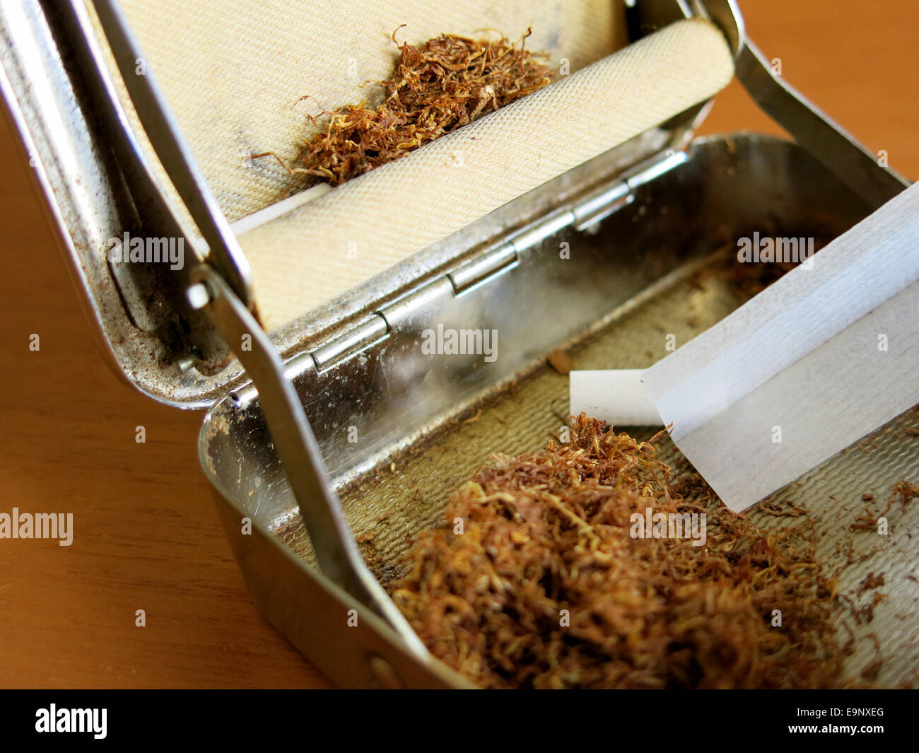 Tobacco, cigarette rolling device Stock Photo Alamy