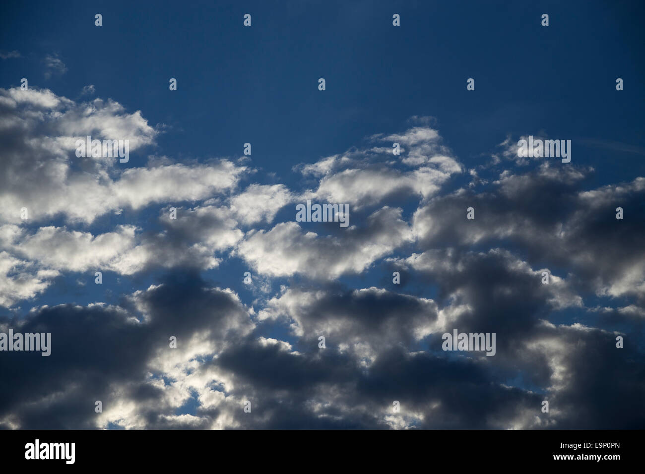 Blue sky among clouds Stock Photo