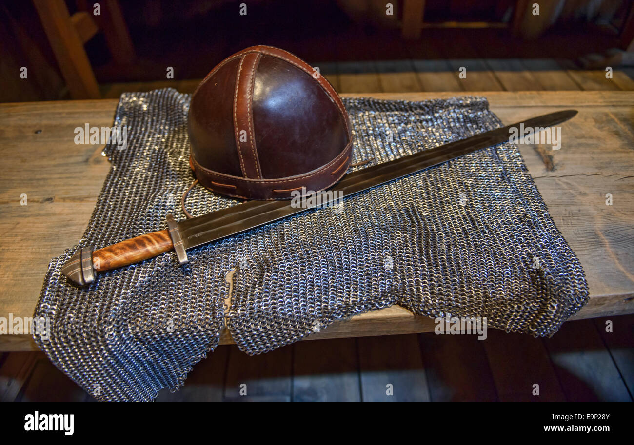 traditional Viking sword, helmet, and chainmail armor in the Lofotr Museum Stock Photo