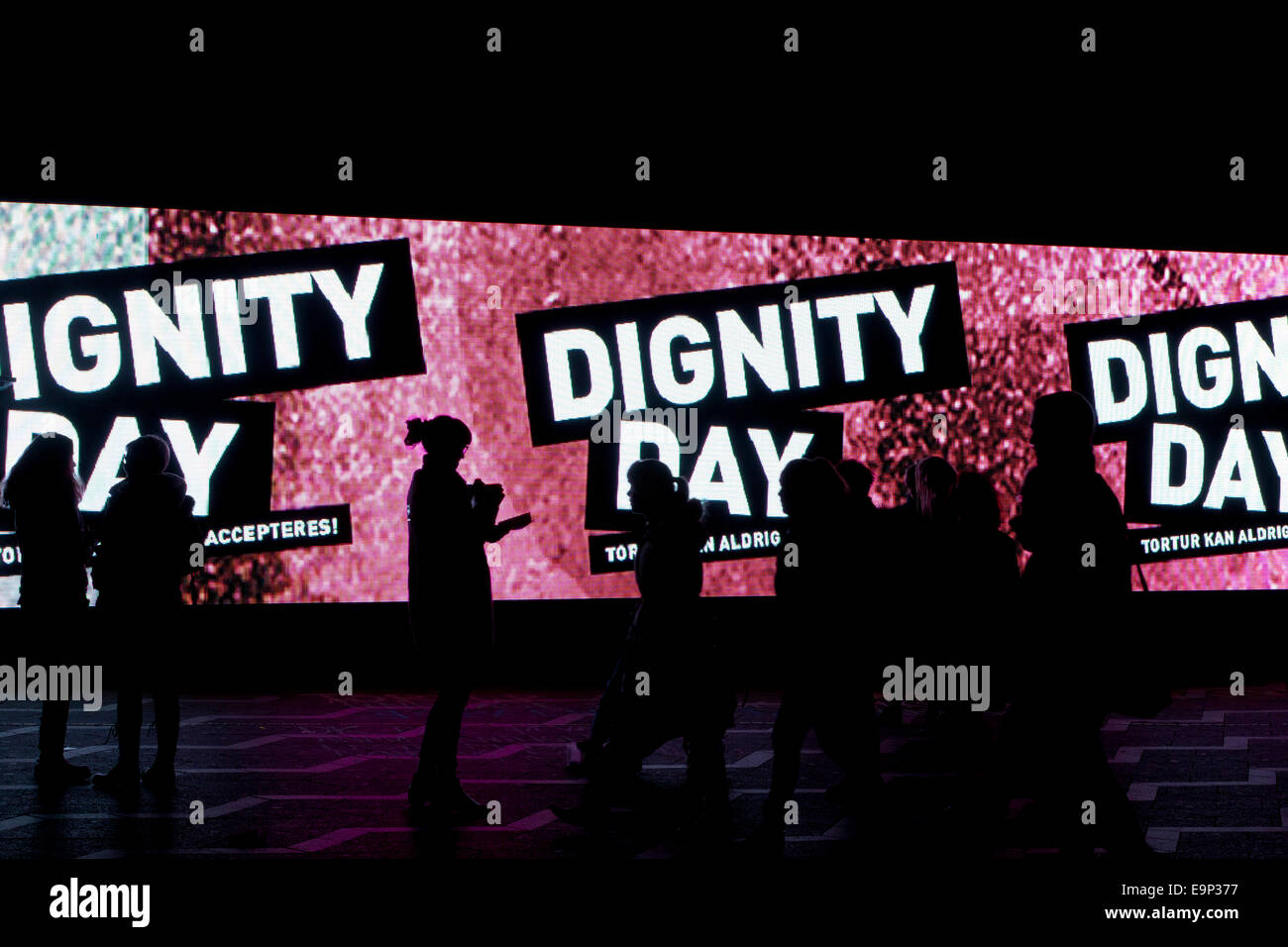 Copenhagen, Denmark – Thursday, October 30, 2014 Large LED billboard at the venue for the Dignity Day against torture and in support of children from torture victimized families.  The event was organized by the “Danish Institute Against Torture” (Dignity) Credit:  OJPHOTOS/Alamy Live News Stock Photo