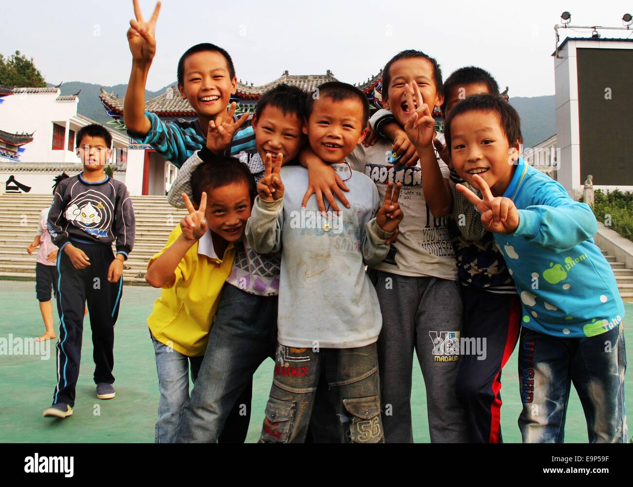 Oct. 27, 2014 - (CHINA OUT) Only for use outside China. Do not use for sale or exhibit in China. XINGGUO CHINA OCT 30: the left-behind children's life after class in Sanliao county, Ganzhou city, Jiangxi Province of China. Their parents had emigrated from the rural areas to the cities. This has created millions of children left behind in the rural areas under the care of relatives, mostly grandparents with little or no education, family friends, or having to take care of themselves. Often, the caretakers do not have the physical ability, financial means nor possess the knowledge needed to take Stock Photo