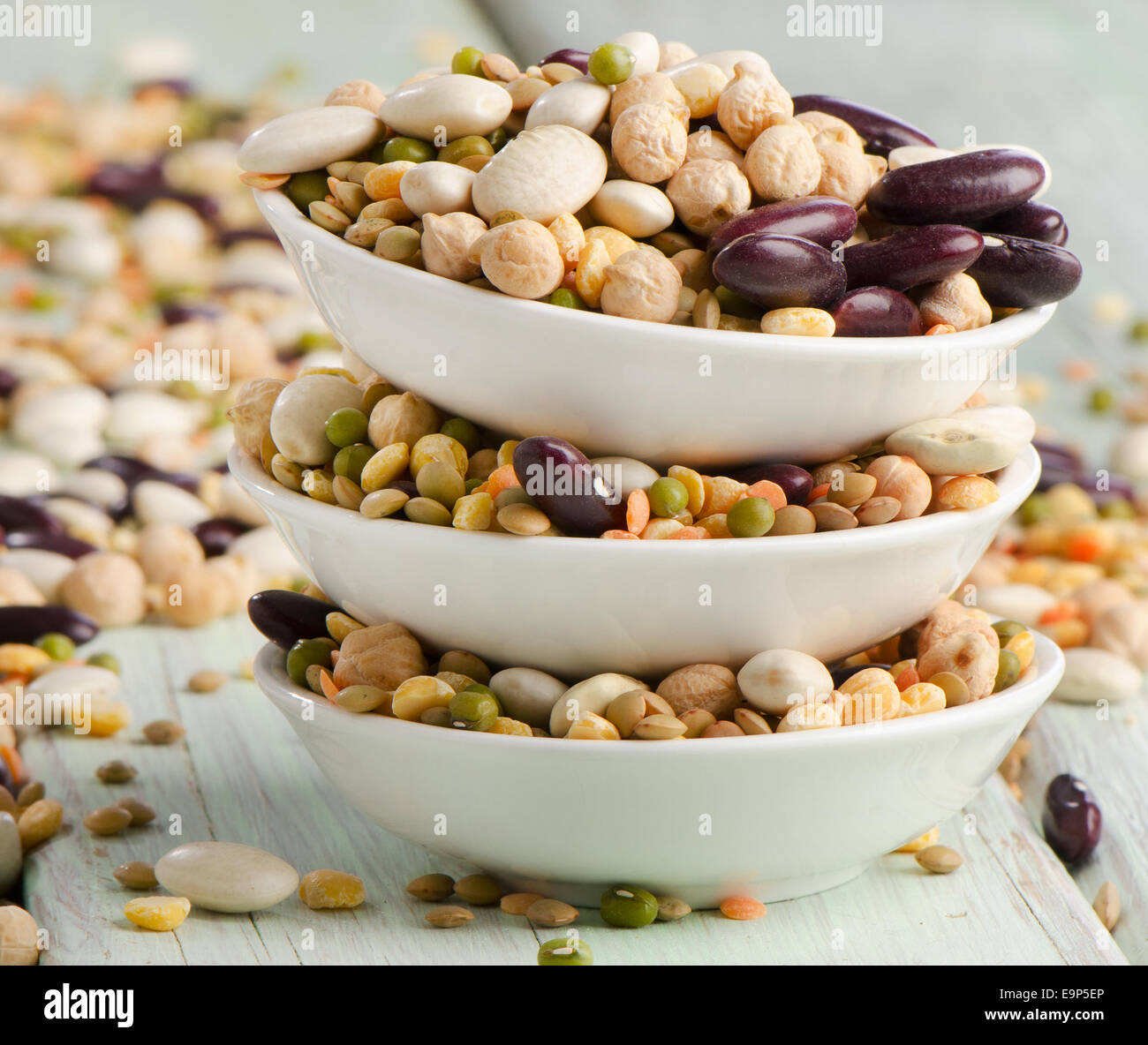 Beans on wooden table. Selective focus Stock Photo