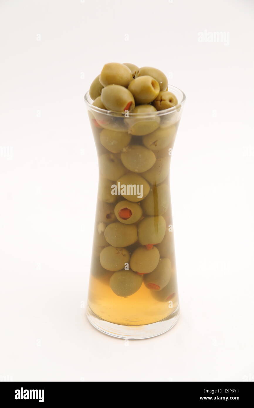 Green olives isolated on a white background Stock Photo - Alamy