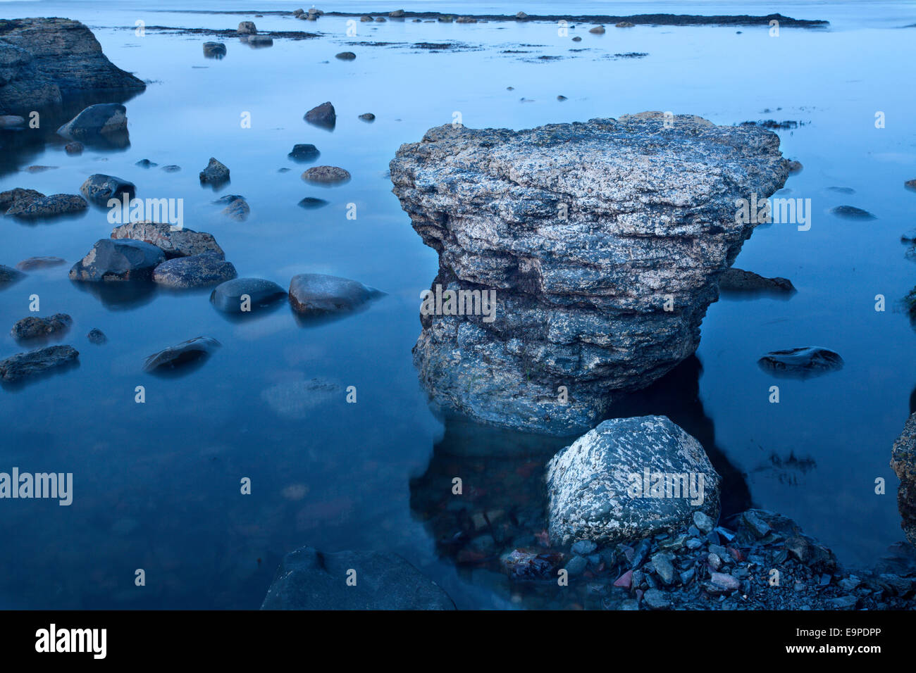 Rock and Tide Robin Hoods Bay Yorkshire Coast England Stock