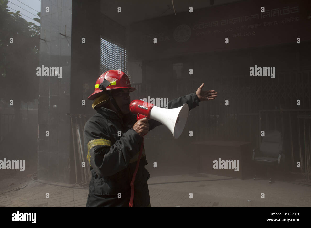 Dhaka, Bangladesh. 31st Oct, 2014. A devastating fire has broken out in the office of Bangla national daily Amar Desh housed at Bangladesh Steel and Engineering Corporation (BSEC) building in the capital's Kawran Bazar.Fire service sources said a total of 20 fire fighting units rushed to the scene, and are trying to bring the blaze under control.Earlier on Feb 26, 2007, offices of 10 institutions including media units the NTV, RTV and Amar Desh were destroyed in a fire incident at the same building. Credit:  Zakir Hossain Chowdhury/ZUMA Wire/Alamy Live News Stock Photo