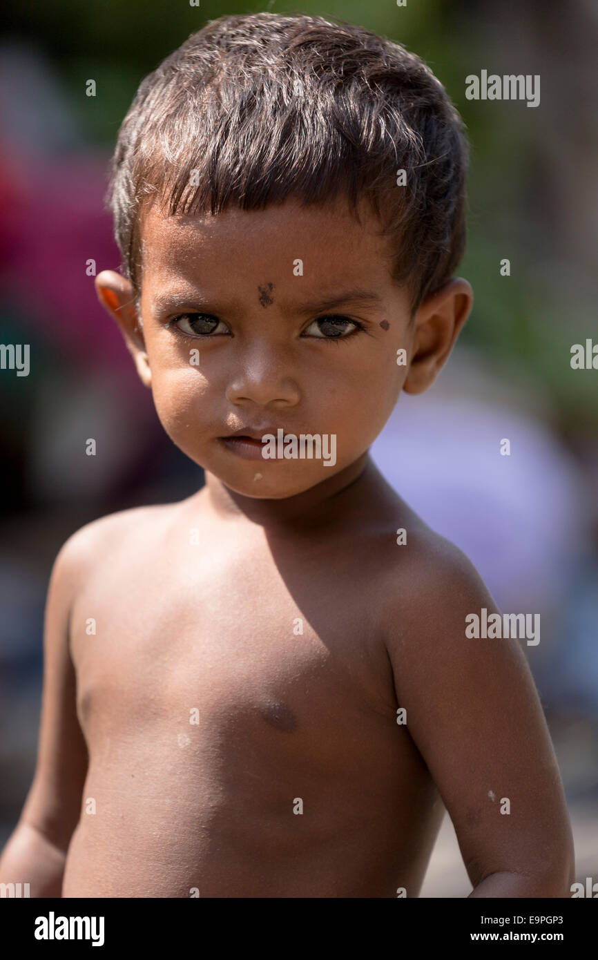 Portrait of child living in the slums of Northern Kolkata, West Bengal, India Stock Photo