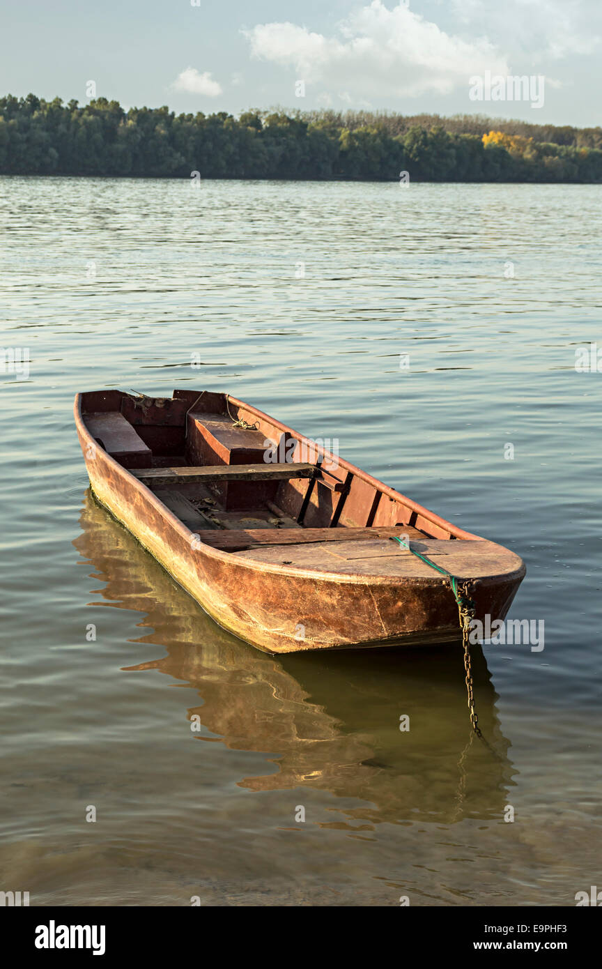 Old fishing boat on lake Stock Photo - Alamy