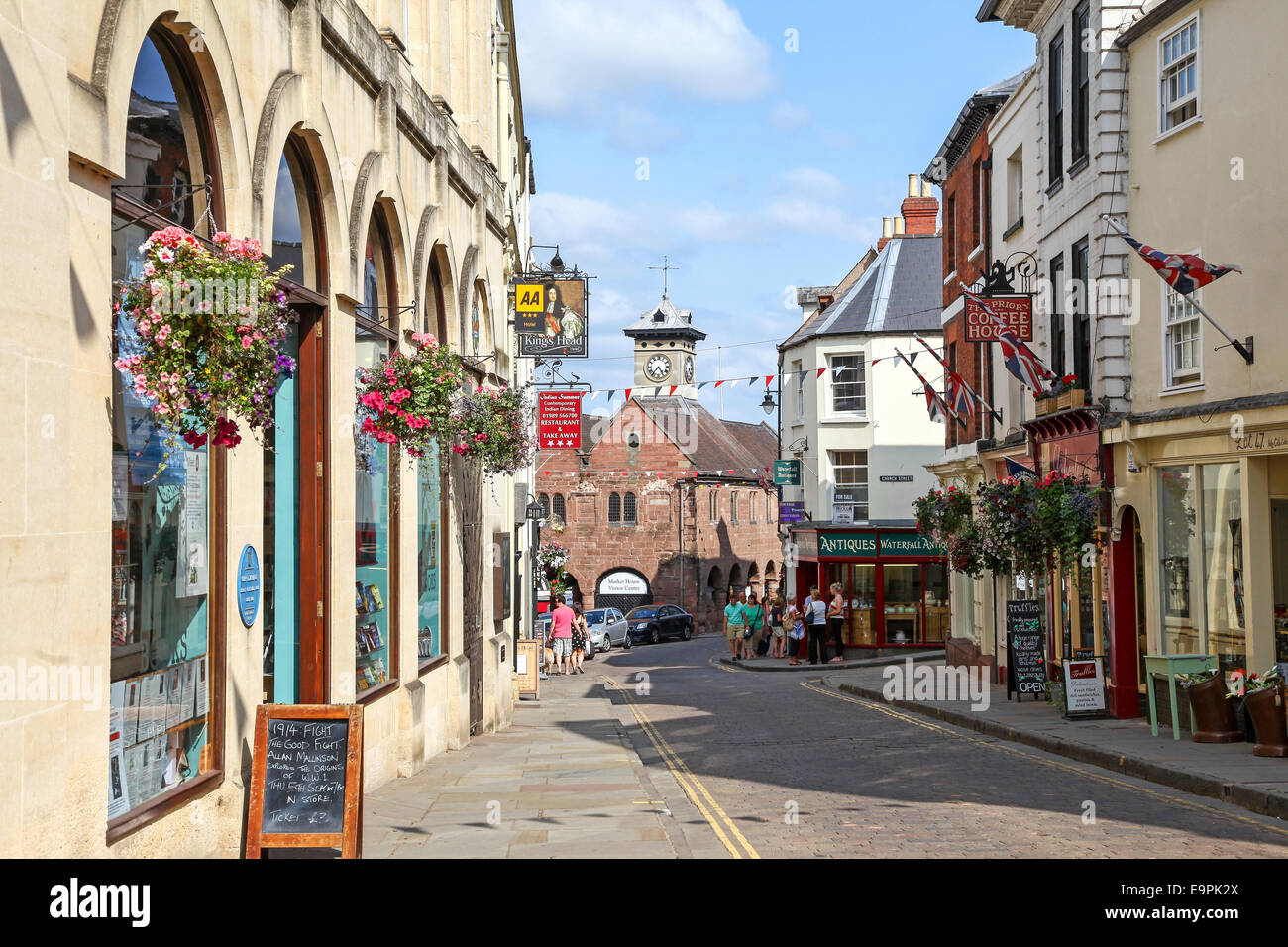 View along High Street towards the market hall with the corn exchange on the left Ross on Wye Herefordshire England UK Stock Photo