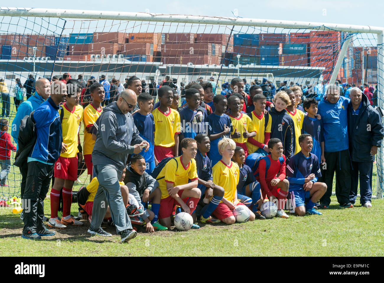 Junior football teams posing for a team photo, Cape Town, South Africa Stock Photo