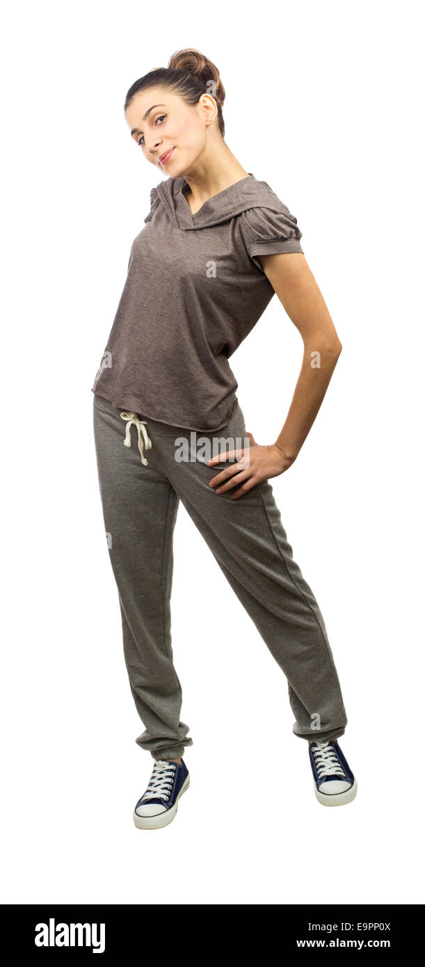 Beautiful young woman standing in full body in sport wear isolated on white background Stock Photo