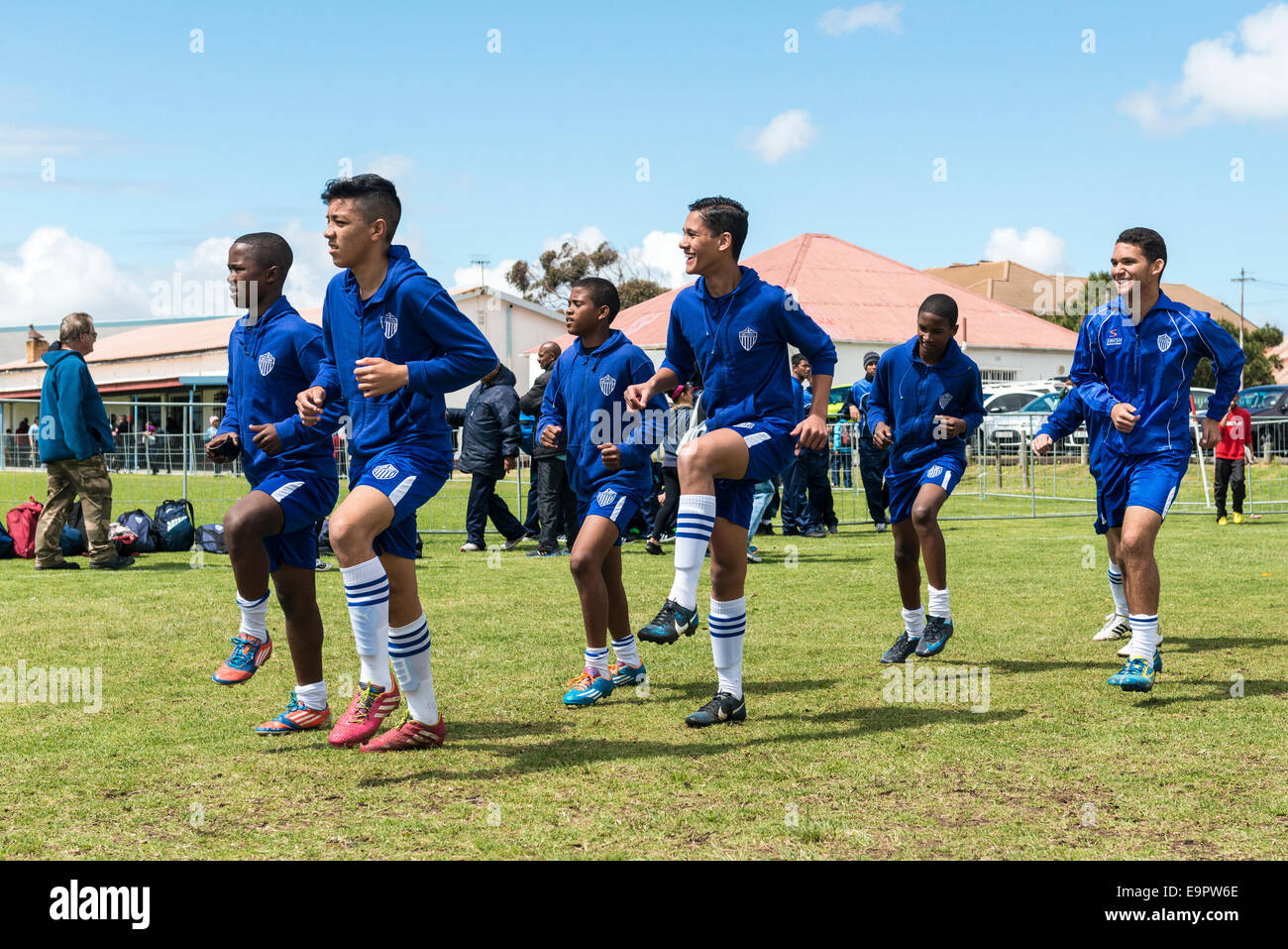 Junior football team practices warm-up before the match, Cape Town, South Africa Stock Photo