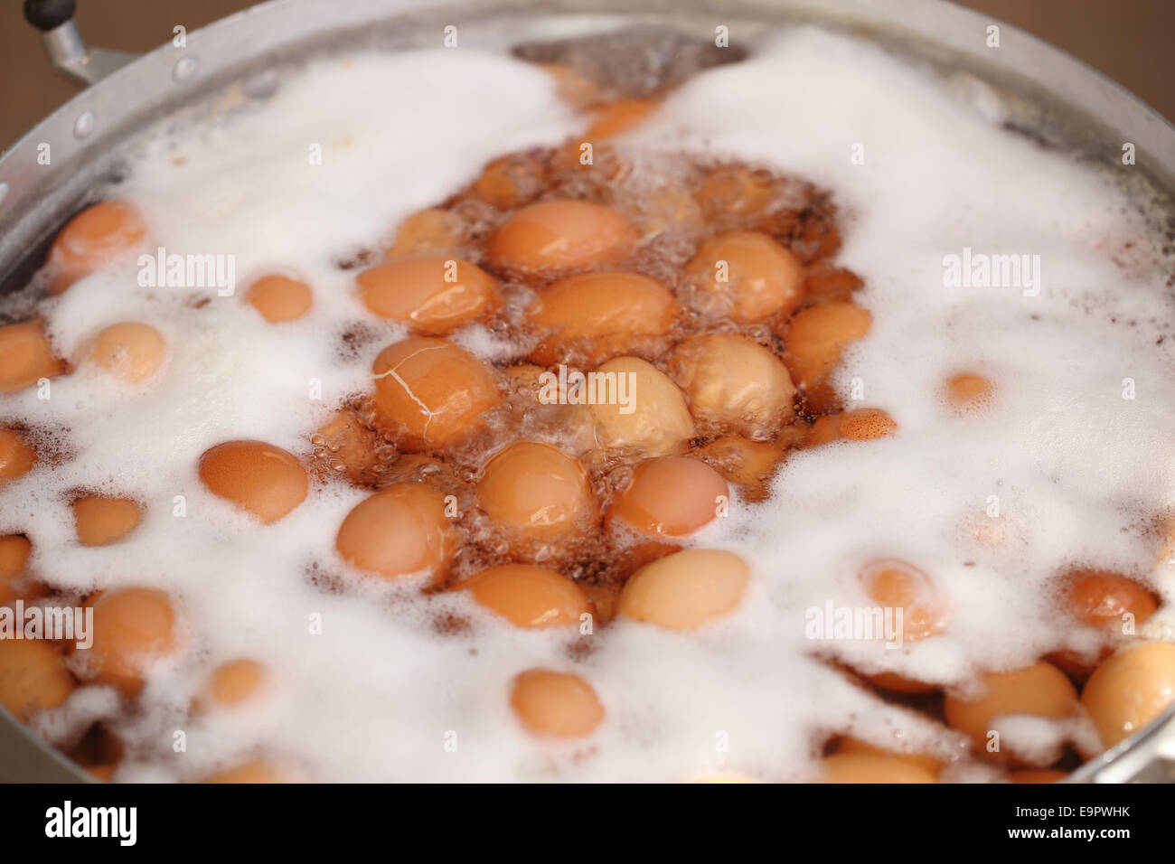 View of Eggs boiled with water in the big pot Stock Photo - Alamy