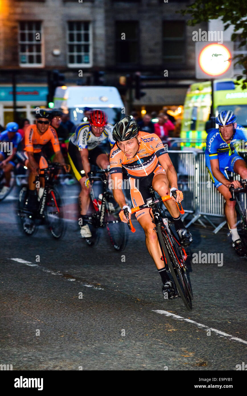 Cyclists racing in evening criterium event in Lancaster Lancashire England Stock Photo