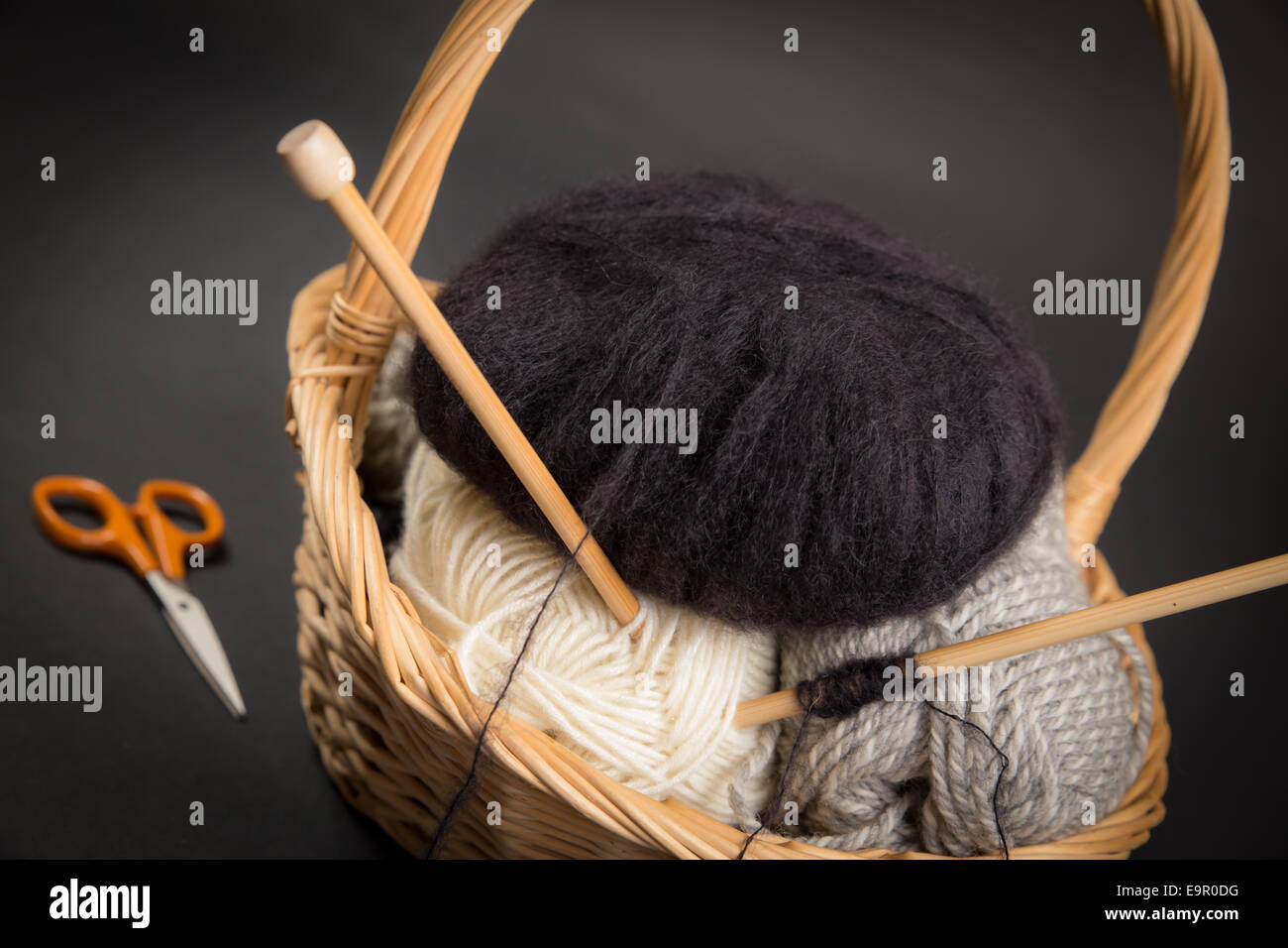 Knitting basket of mohair and other yarns with needles Stock Photo - Alamy