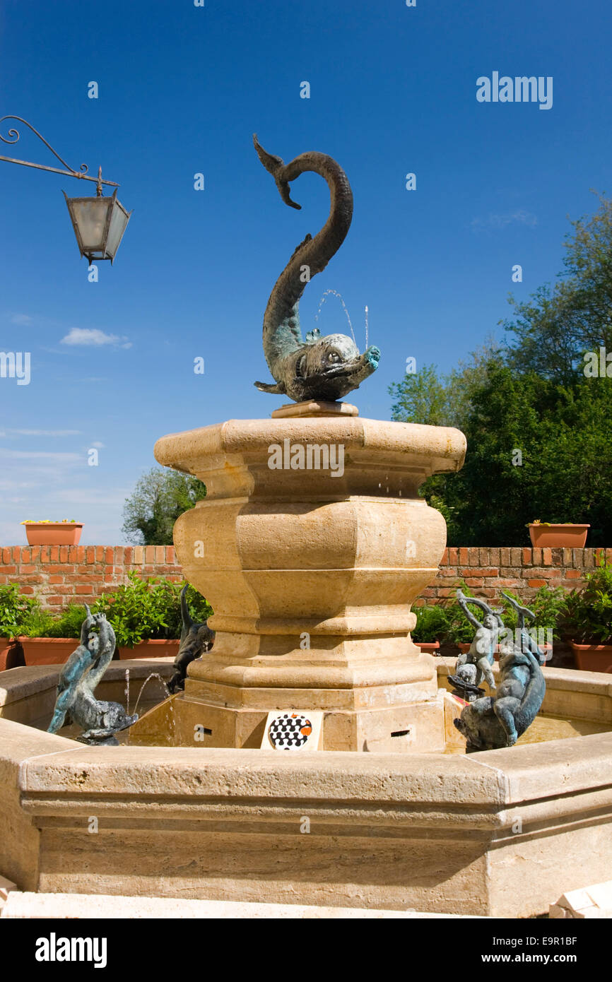 Siena, Tuscany, Italy. Dolphin fountain in Via Fontanella marking