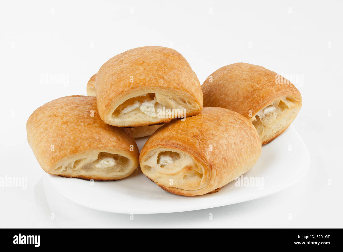 pastry with cheese  on whit plate Stock Photo
