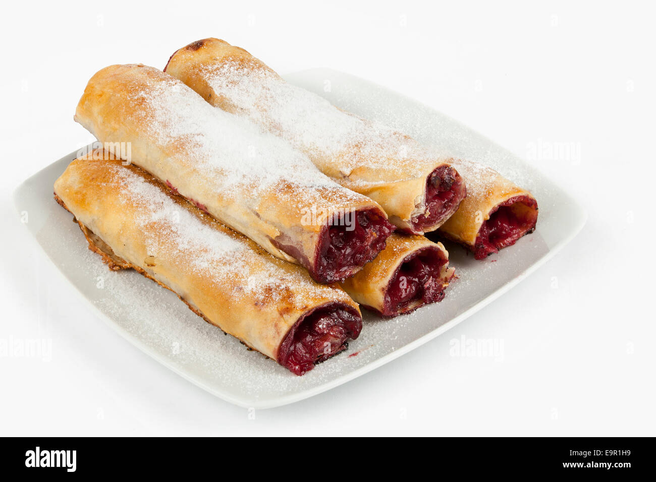 pie with cherry on white plate Stock Photo