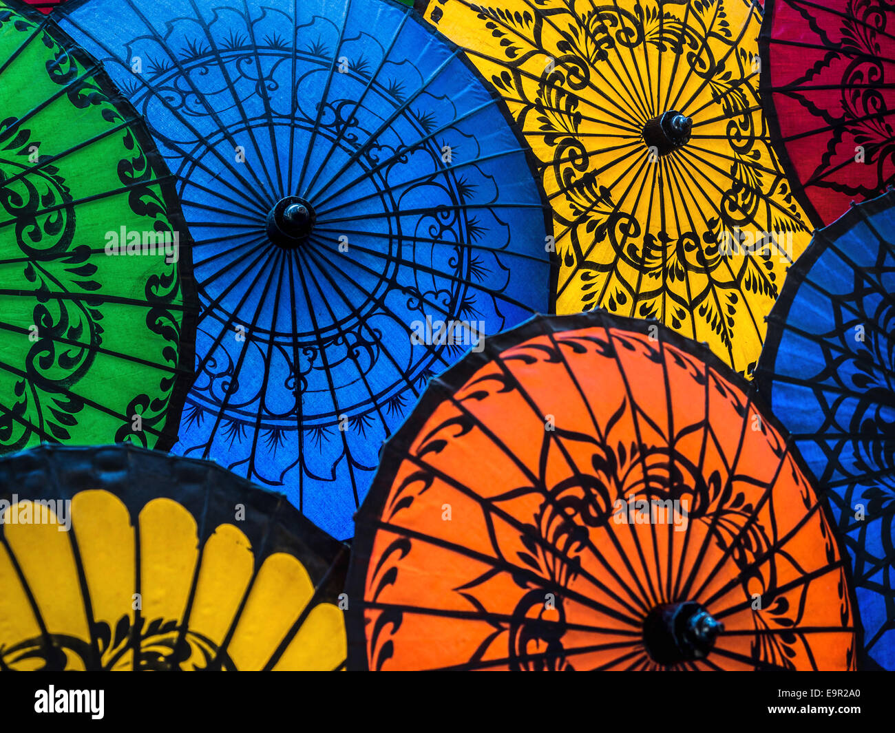 Colorful umbrellas on display at street market in Bagan, Mandalay Region, Myanmar (Burma). Stock Photo