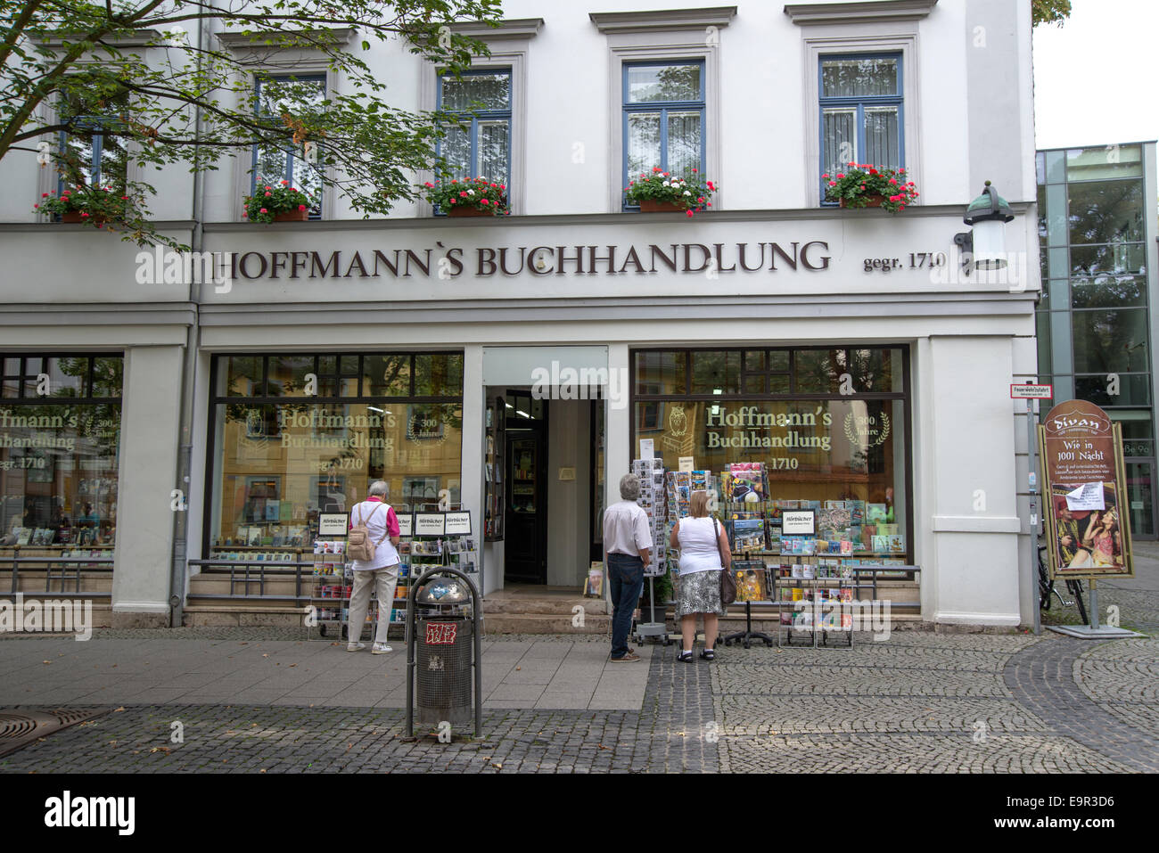 Tourists look at showcase famous Weimar, federal state of