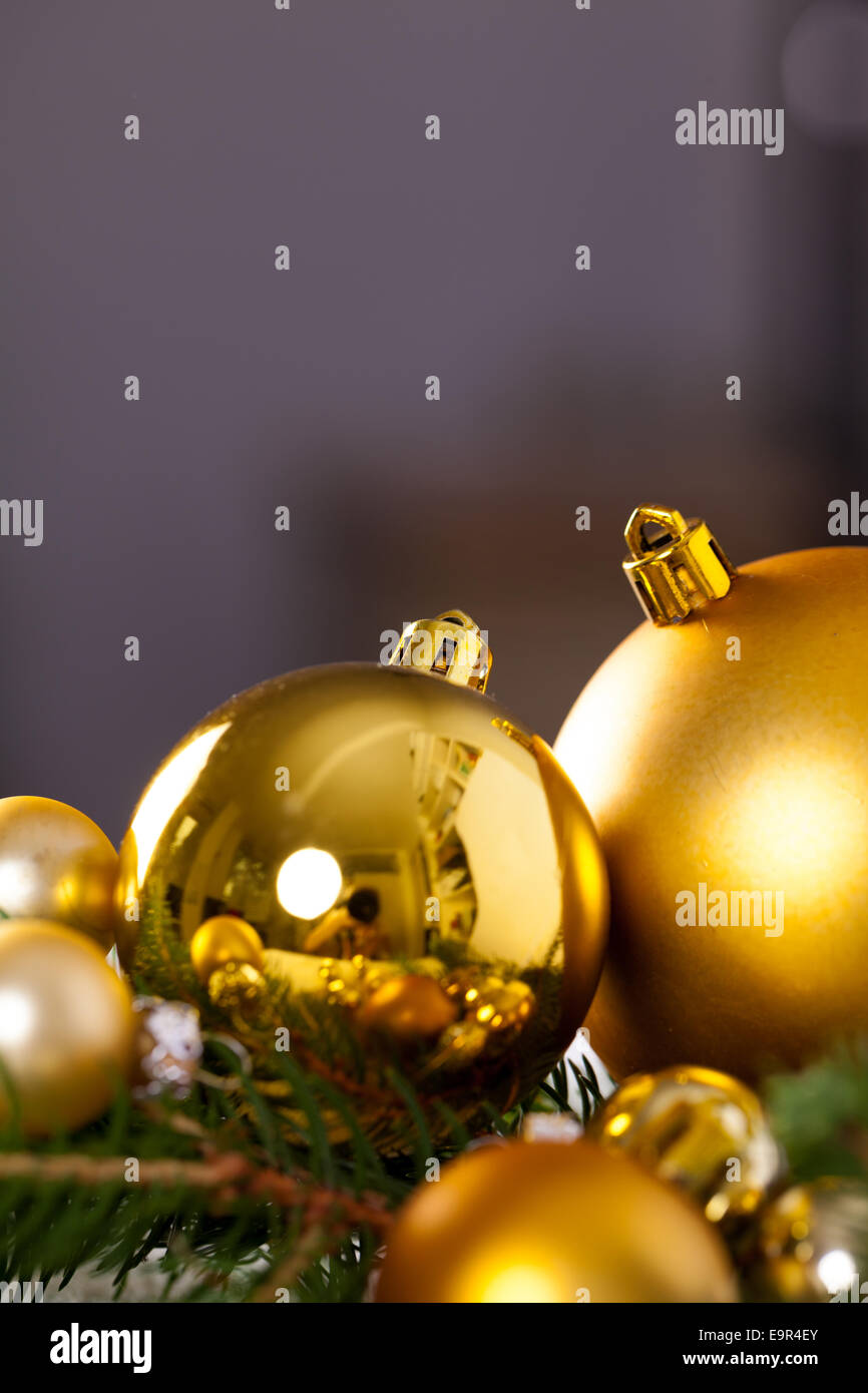 Golden Christmas decoration background with a variety of gold baubles ...