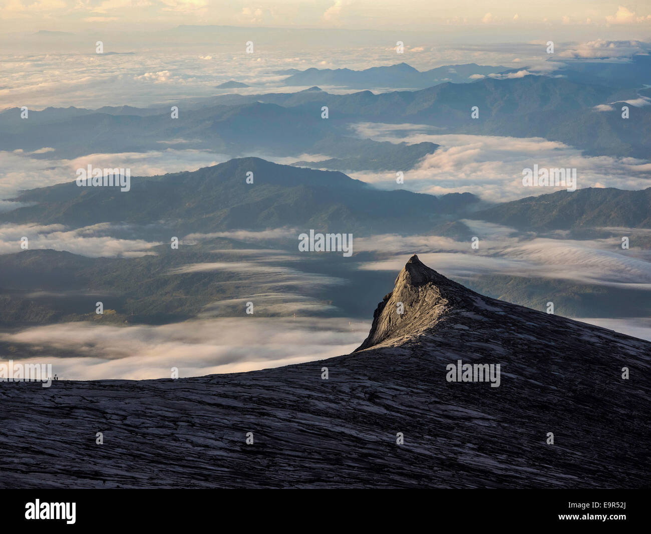 Sunrise at Mount Kinabalu, the highest peak in the Malay Archipelago, in Sabah, East Malaysia. Stock Photo