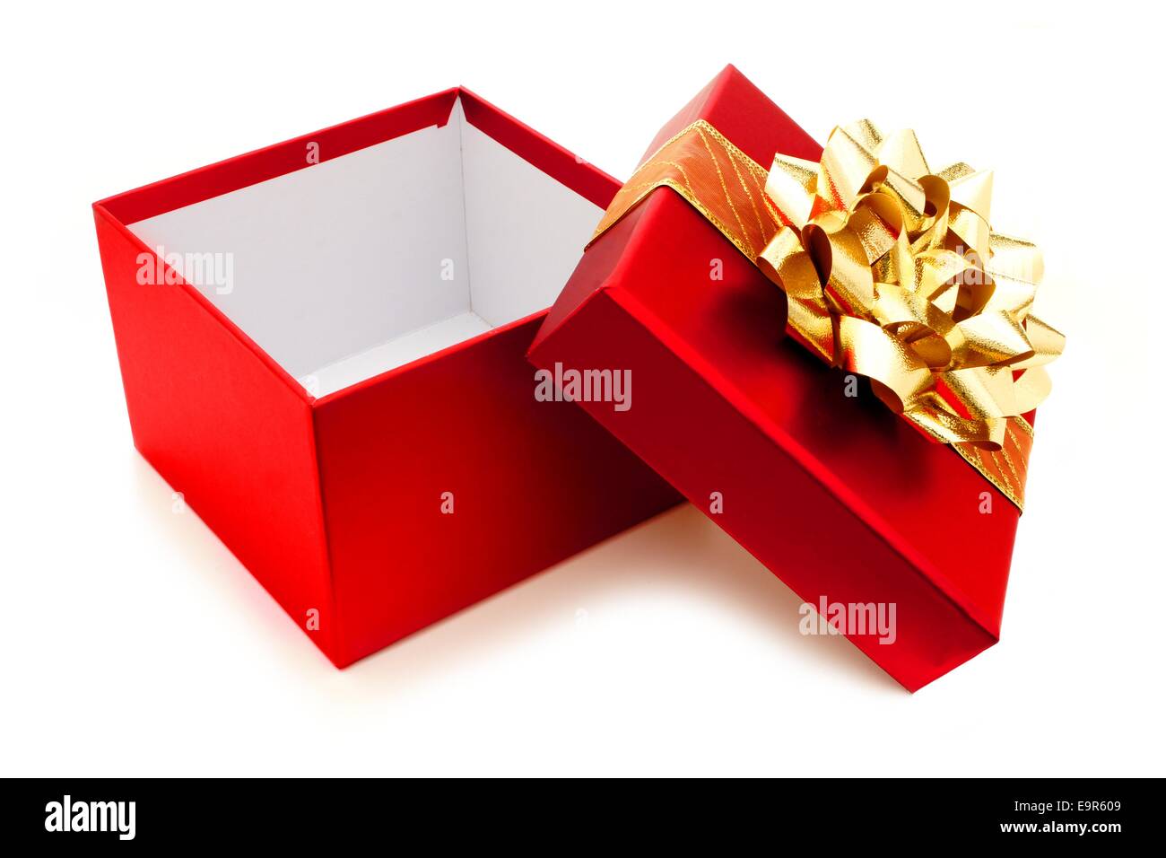Download Opened Red Christmas Gift Box With Gold Bow And Ribbon Stock Photo Alamy PSD Mockup Templates