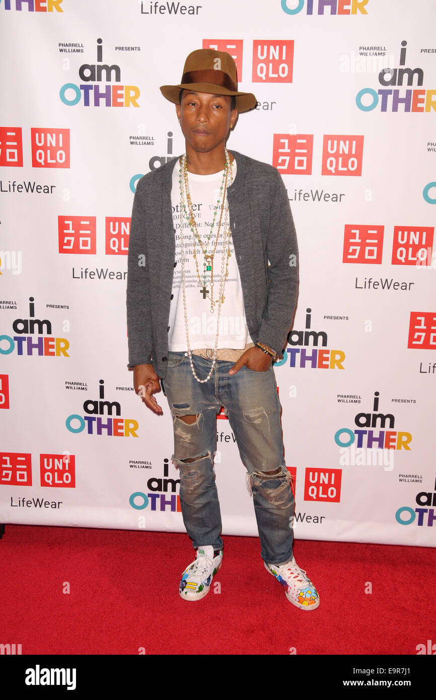 Pharrell Williams and UNIQLO Collaboration - 'I Am Other' Collection Launch  Featuring: Pharrell Williams Where: Manhattan, New York, United States  When: 28 Apr 2014 Stock Photo - Alamy