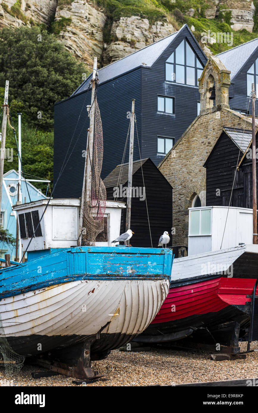 Fishing boats and tackle house on The Stade beach in Old Town Hastings