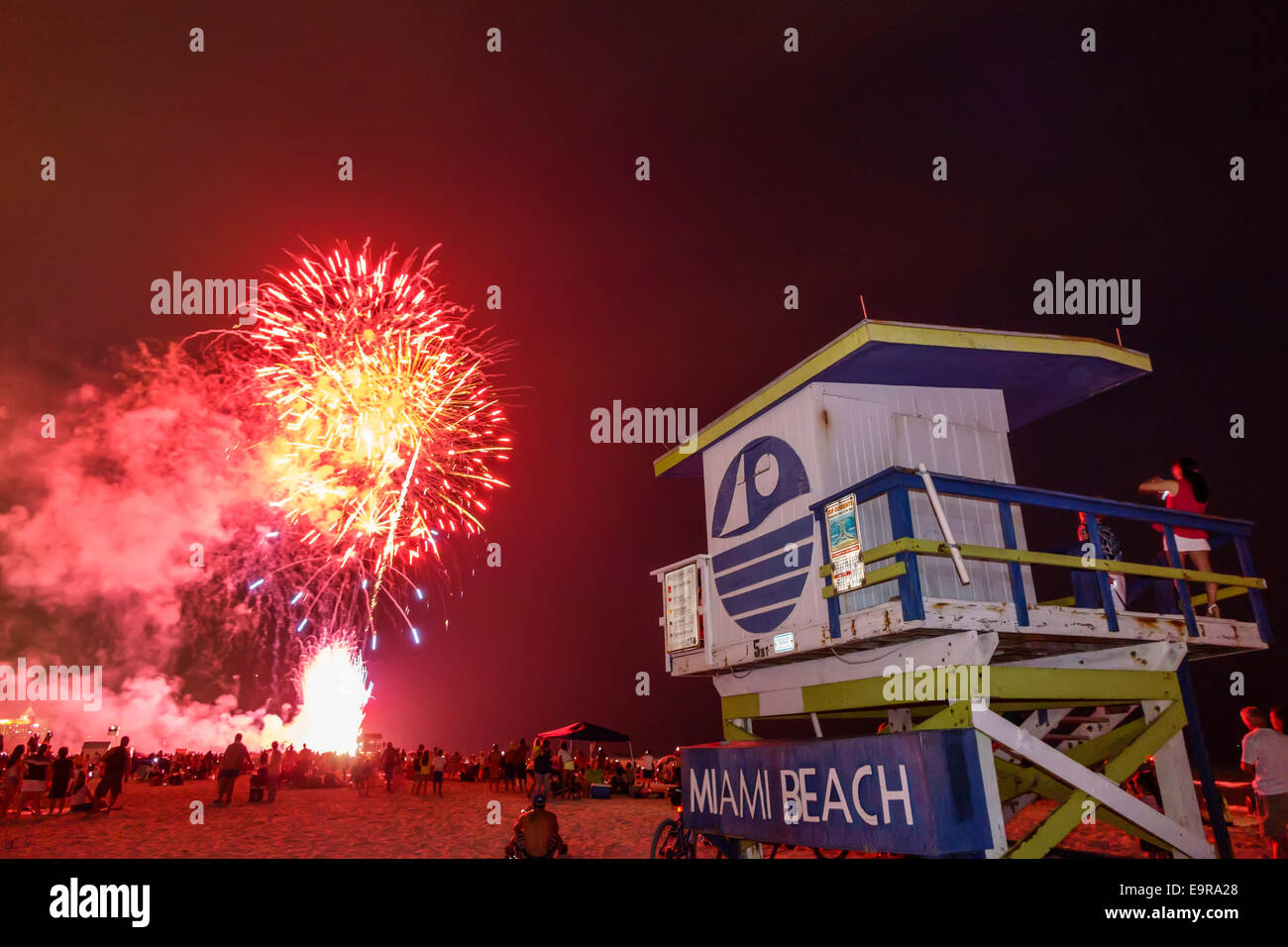 Miami Beach Florida,4th Fourth of July,fireworks products,display burst,night,lifeguard station sand,FL140704014 Stock Photo