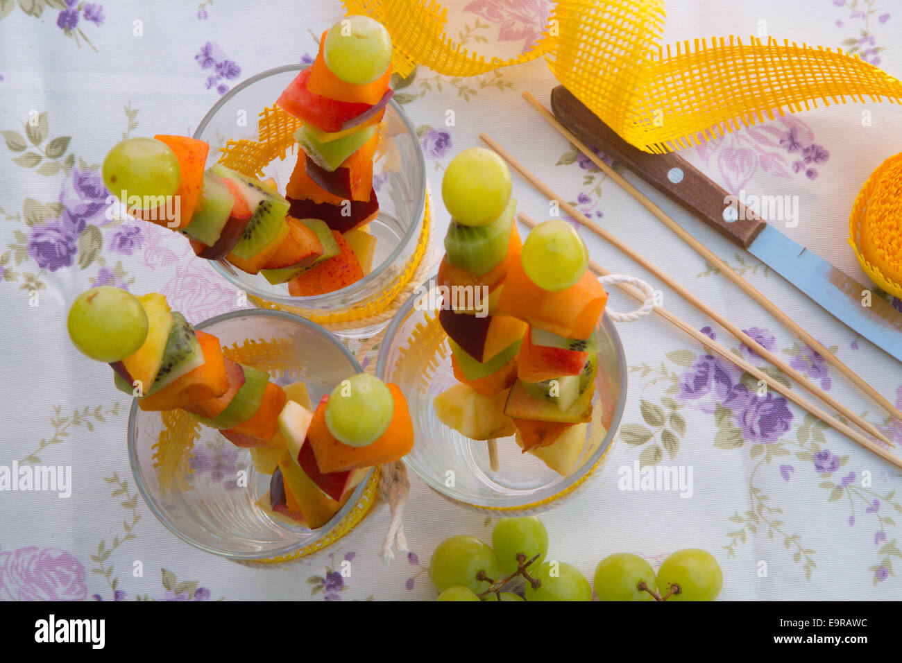 Fruit salad skewers in the glasses Stock Photo Alamy