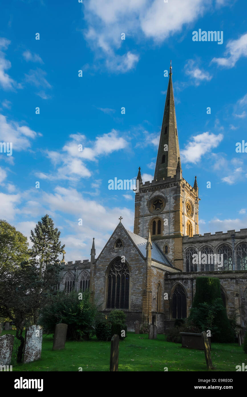 Gravestones with the Holy Trinity Church to the rear, Stratford-Upon-Avon, the resting place of William Shakespeare Stock Photo