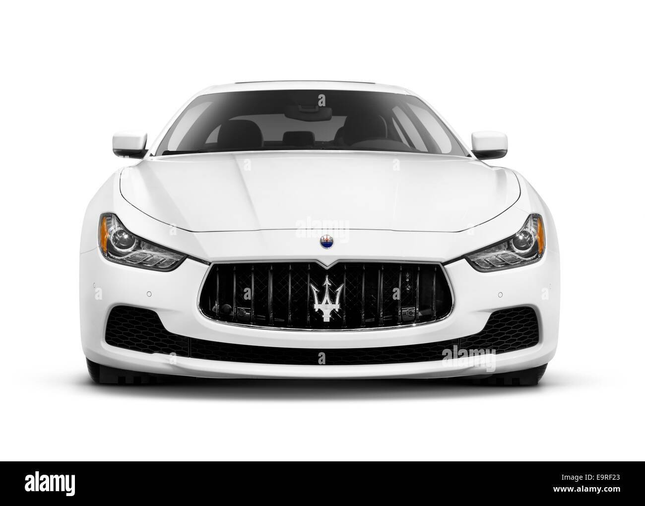 License and prints at MaximImages.com - White 2014 Maserati Ghibli S Q4 luxury car front view isolated on white background with clipping path Stock Photo