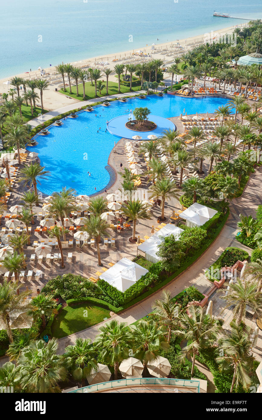 View Over The Swimming Pool And Sun Bed Area Of The Atlantis Hotel The Palm Dubai UAE Stock Photo