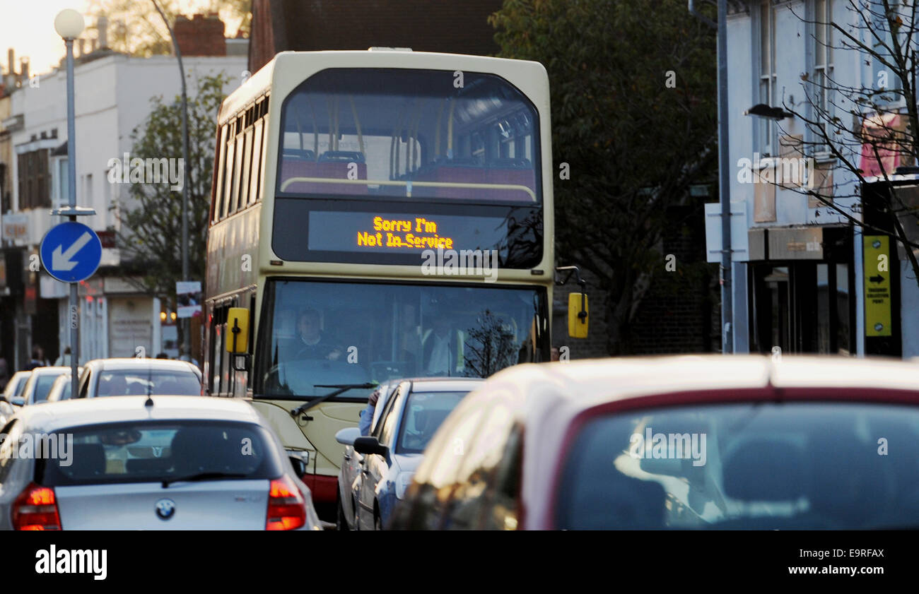 Brighton and Hove bus with the sign Sorry I'm Not in Service displayed on the front driving down congested street in the city Stock Photo