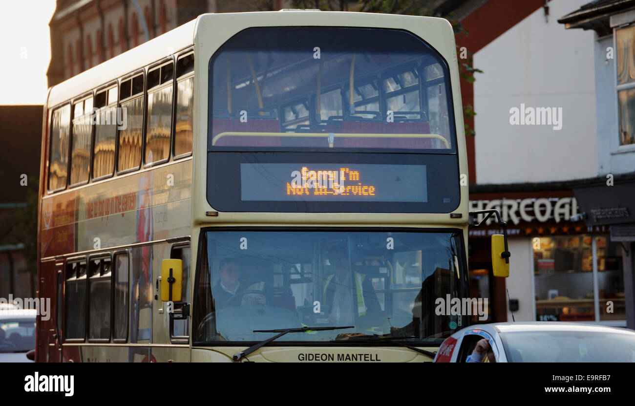 Brighton and Hove bus with the sign Sorry I'm Not in Service displayed on the front driving down congested street in the city Stock Photo