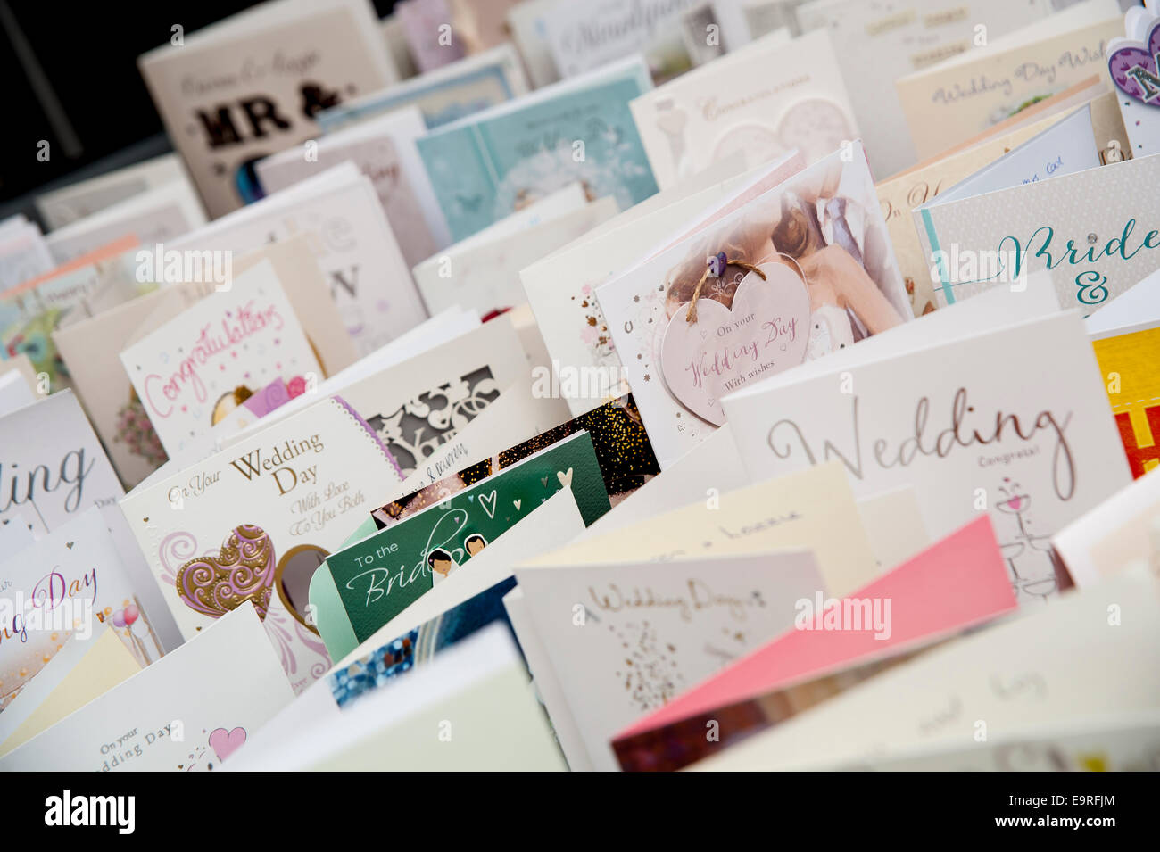 Wedding congratulating cards stood up on a table after a wedding. Stock Photo
