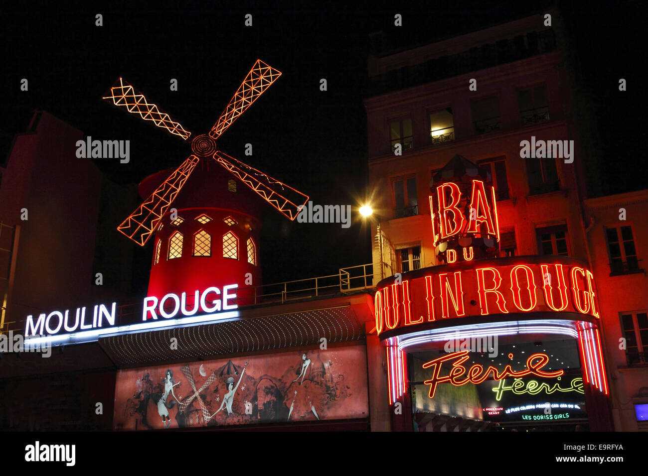Moulin Rouge by night in Pigalle, Paris, France Stock Photo