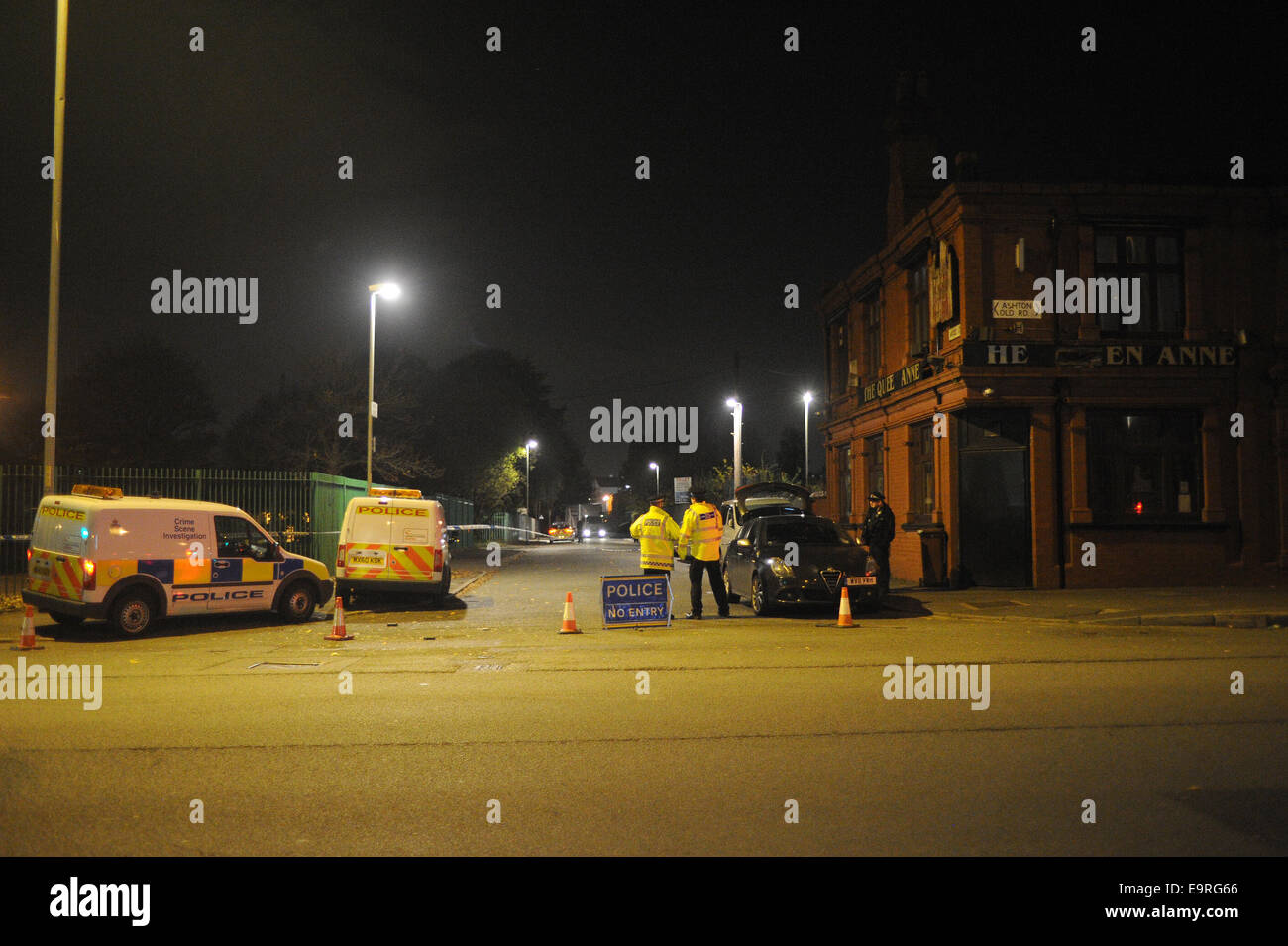 Openshaw, Manchester, UK. 31st October, 2014. Police have launched a murder inquiry after a man died of gunshot wounds in  Manchester.  The victim was found collapsed with gunshot injuries near to Manchester Food Traders on Wood Street in Openshaw. 31st October 2014. Stock Photo