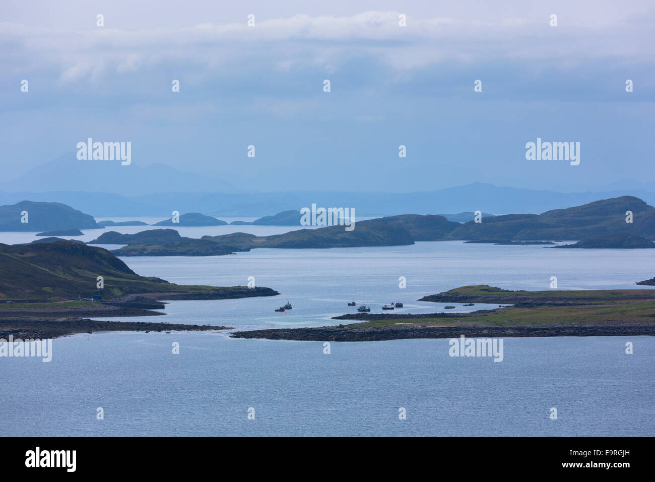 The Summer Isles, part of the Inner Hebrides, and the Outer Hebrides view from Altandhu on the West Coast of SCOTLAND Stock Photo