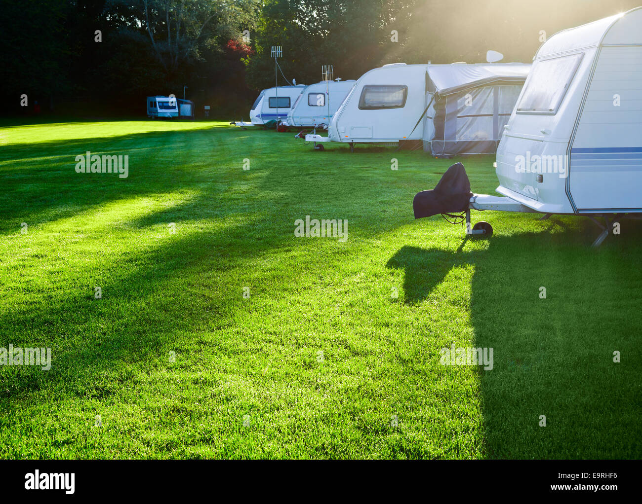 Campsite with caravans in a morning light Stock Photo