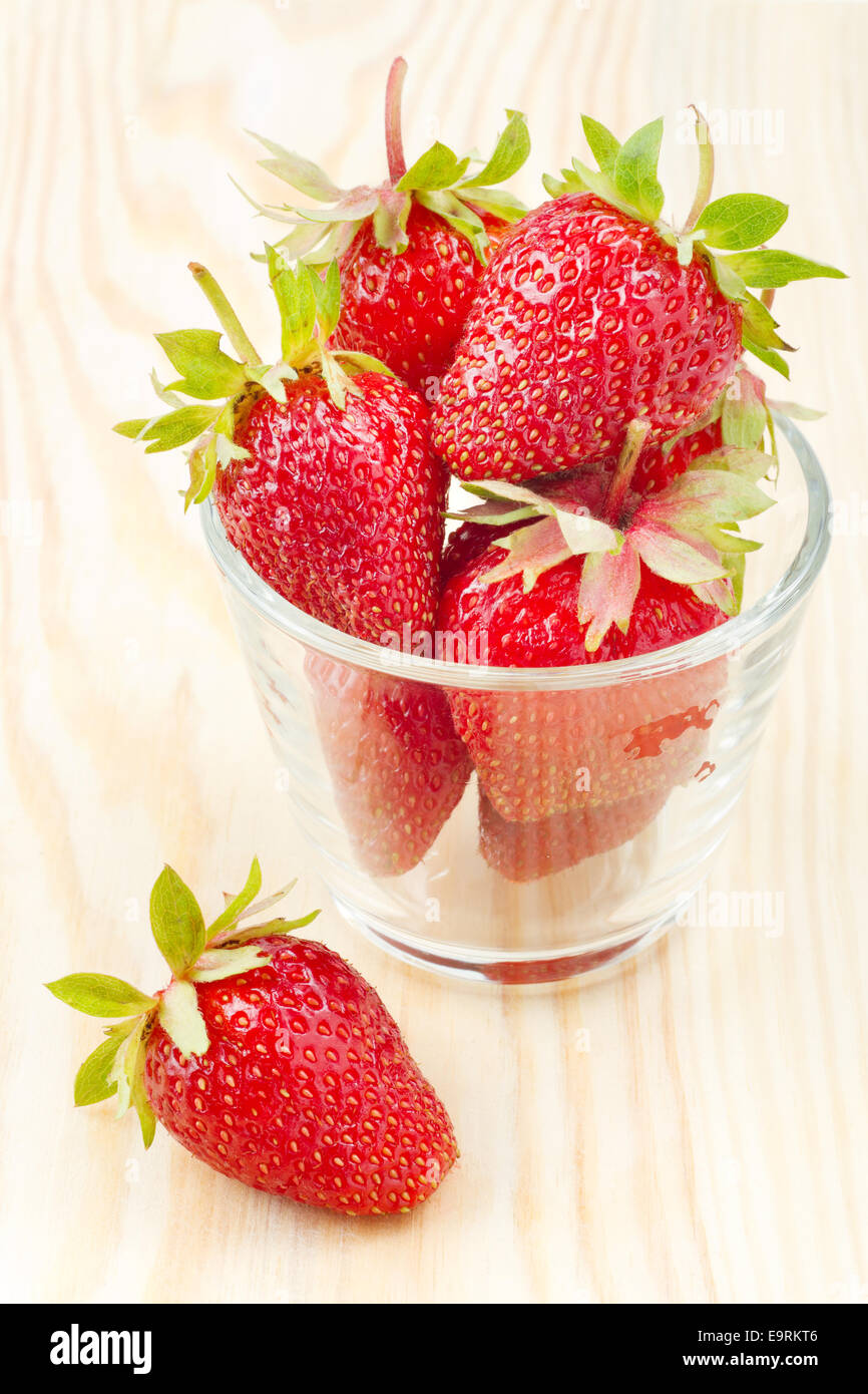 big red strawberries in a glass bowl Stock Photo - Alamy