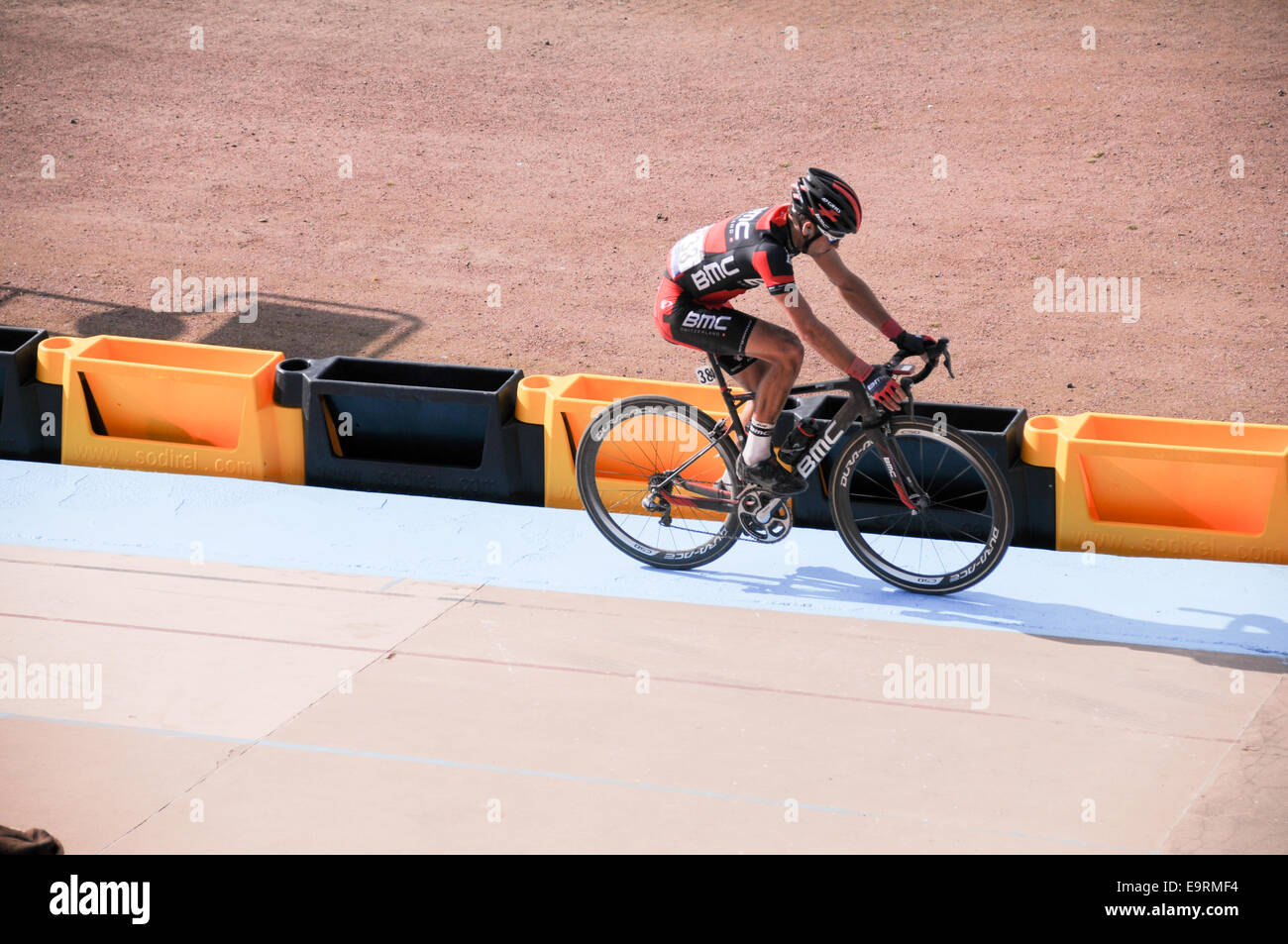 Swiss BMC rider Danilo Wyss rolls in to a 76th. place at the 2014 Paris Roubaix. Stock Photo