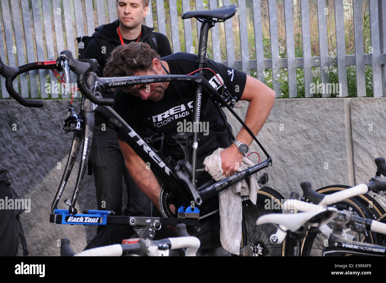 Fabian Cancellaras bike get some tender lover and care from team Trek bike mechanic after the 2014 Paris Roubaix cycle race Stock Photo