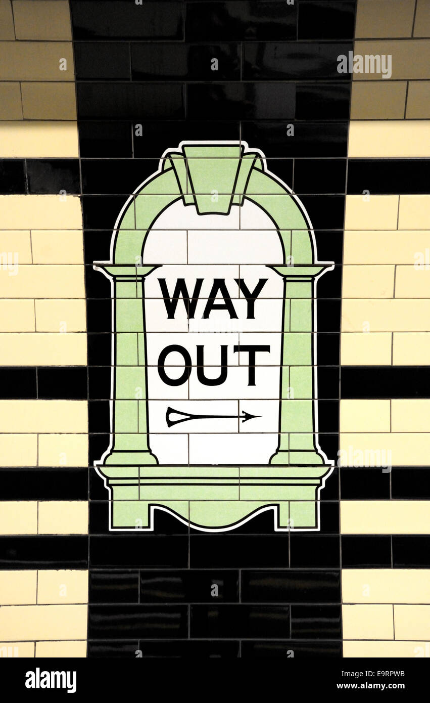 London, England, UK. Tiled sign at Warren Street tube station - Way Out Stock Photo