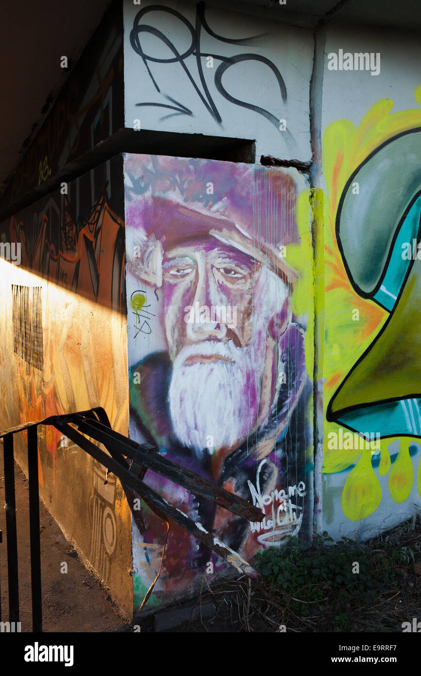 Old man with white beard portrait graffiti, street art in Warsaw, Poland. Stock Photo