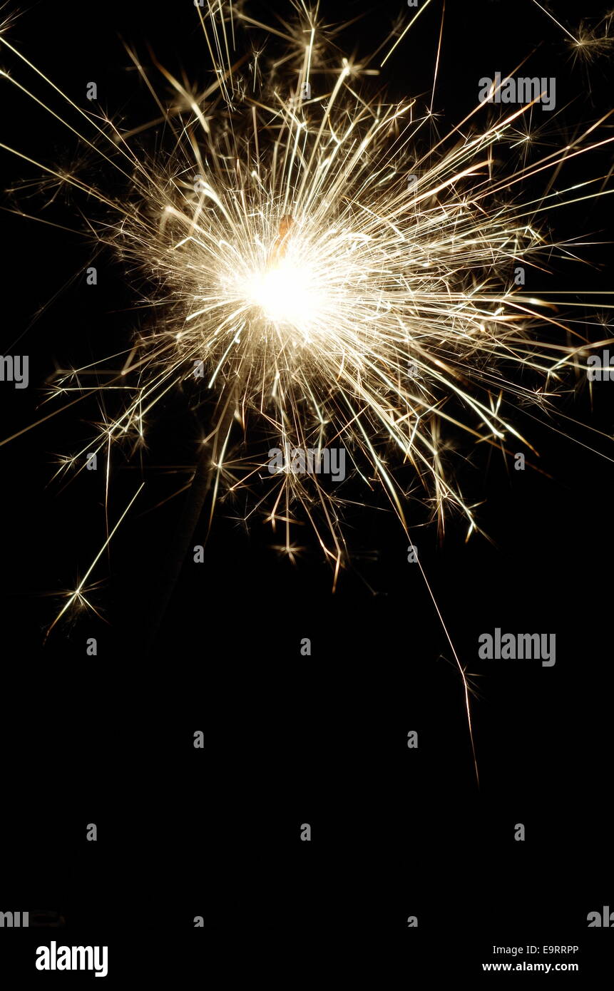 Spark stick lit on a dark background Stock Photo Alamy
