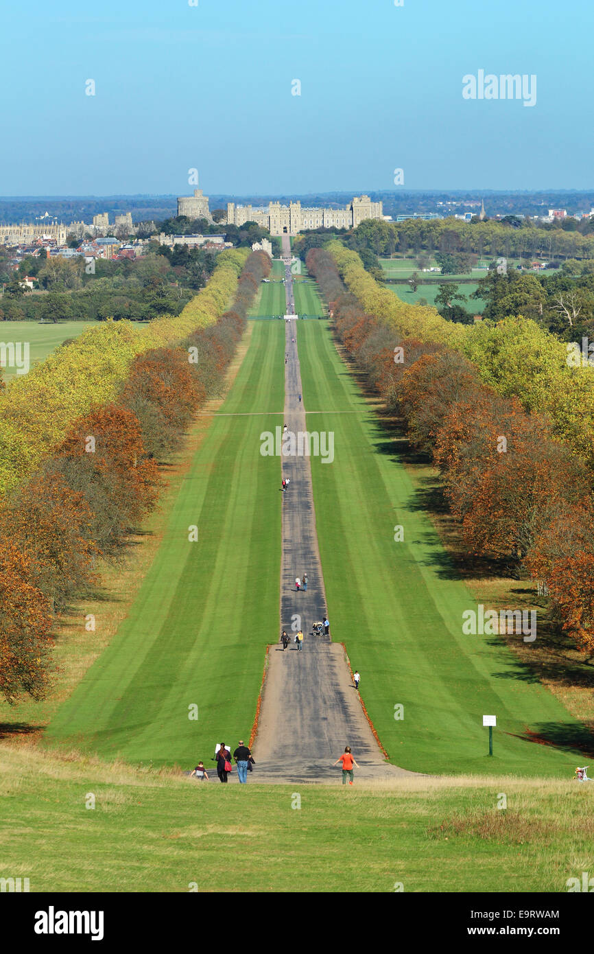 Windsor Castle from snow hill on the Long Walk in Windsor Great Park with Autumn colours Stock Photo