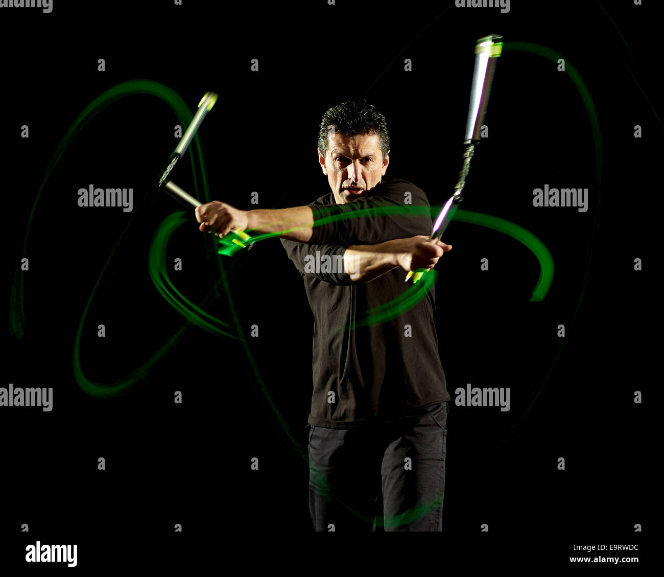 Bewegung des Nunchaku mit Kämpfer Stock Photo