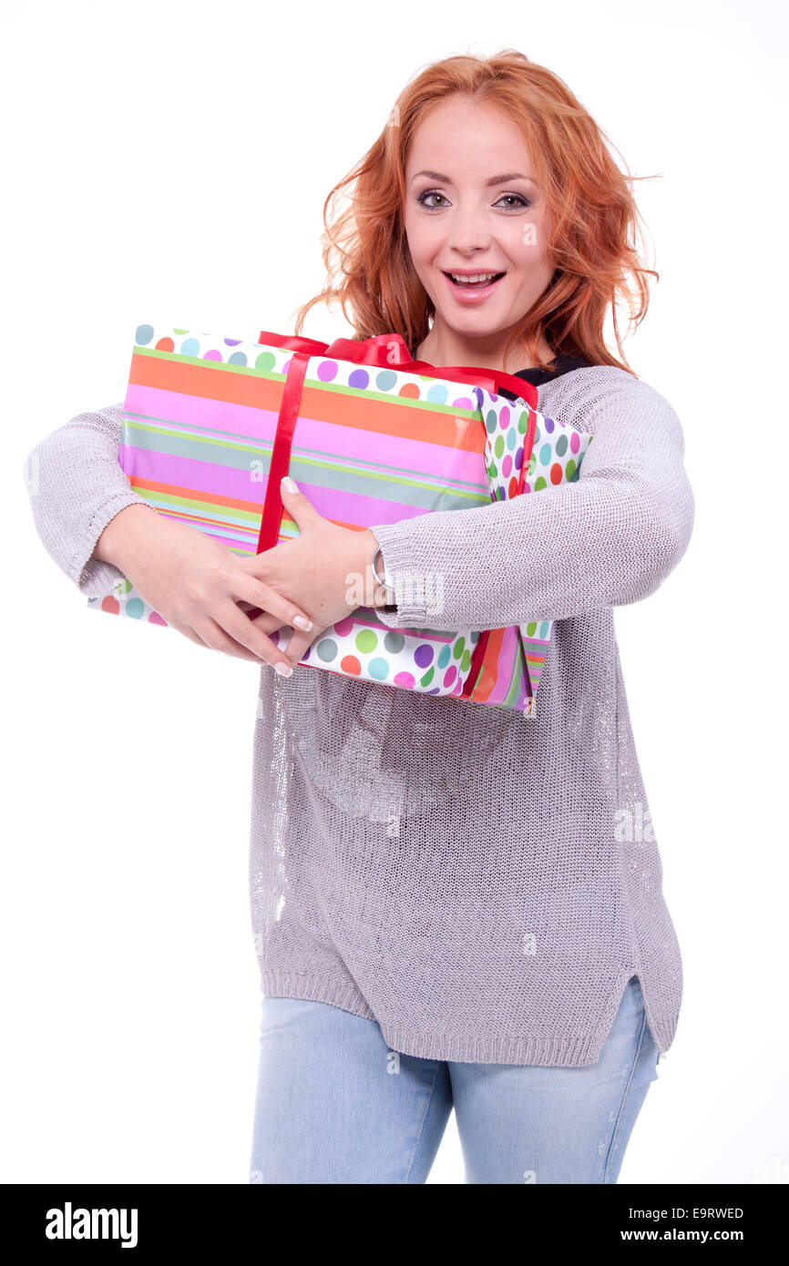 Woman holding gift box on white background Stock Photo